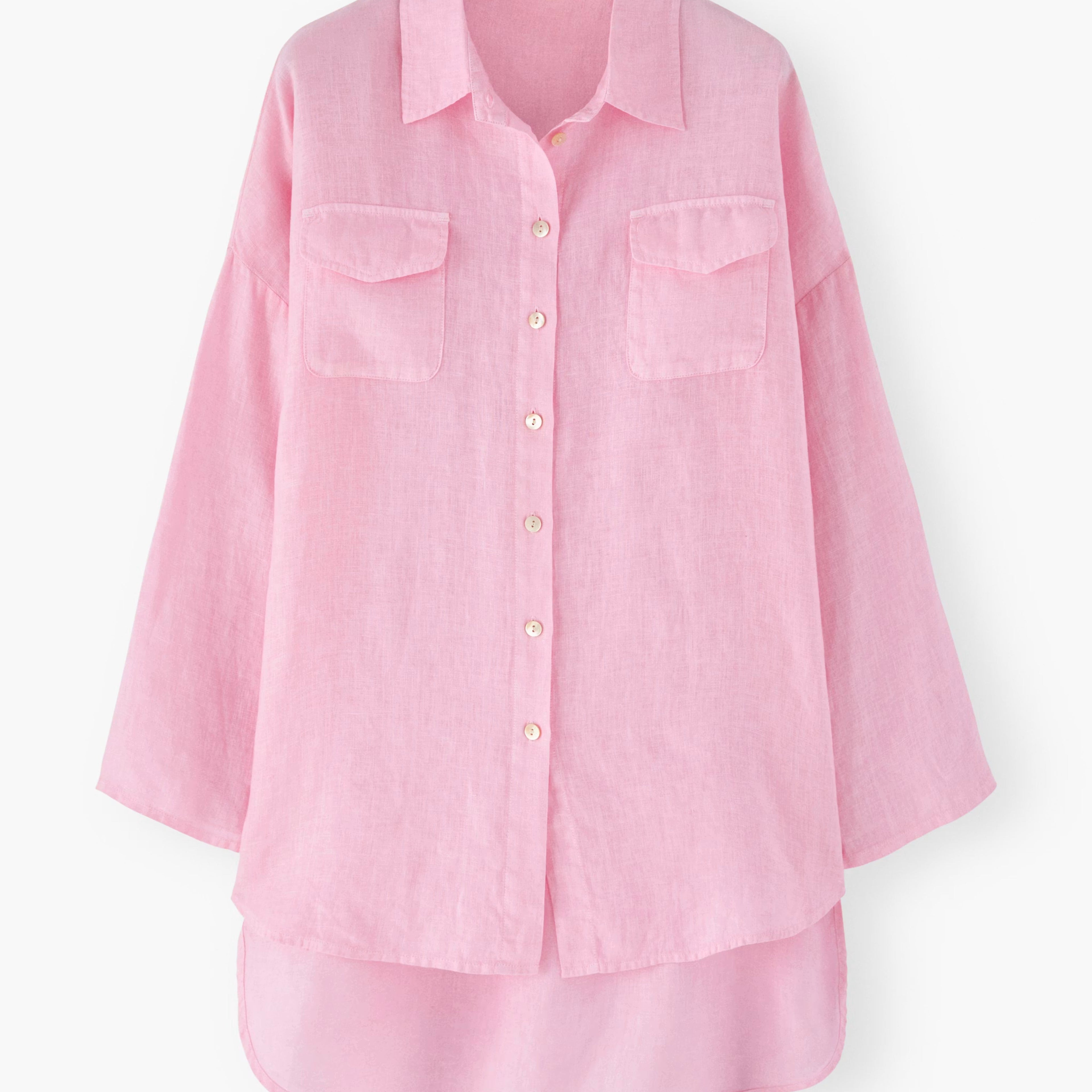 Pale pink loose fit long sleeve shirt with a collar